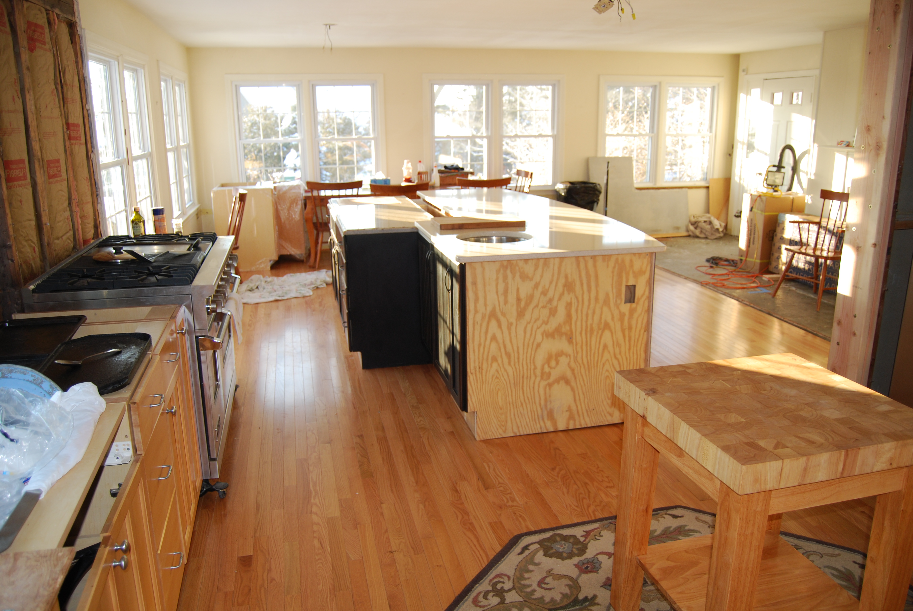 Brand new hardwood floors, and a beautiful island to extend the kitchen feel a bit into this area.