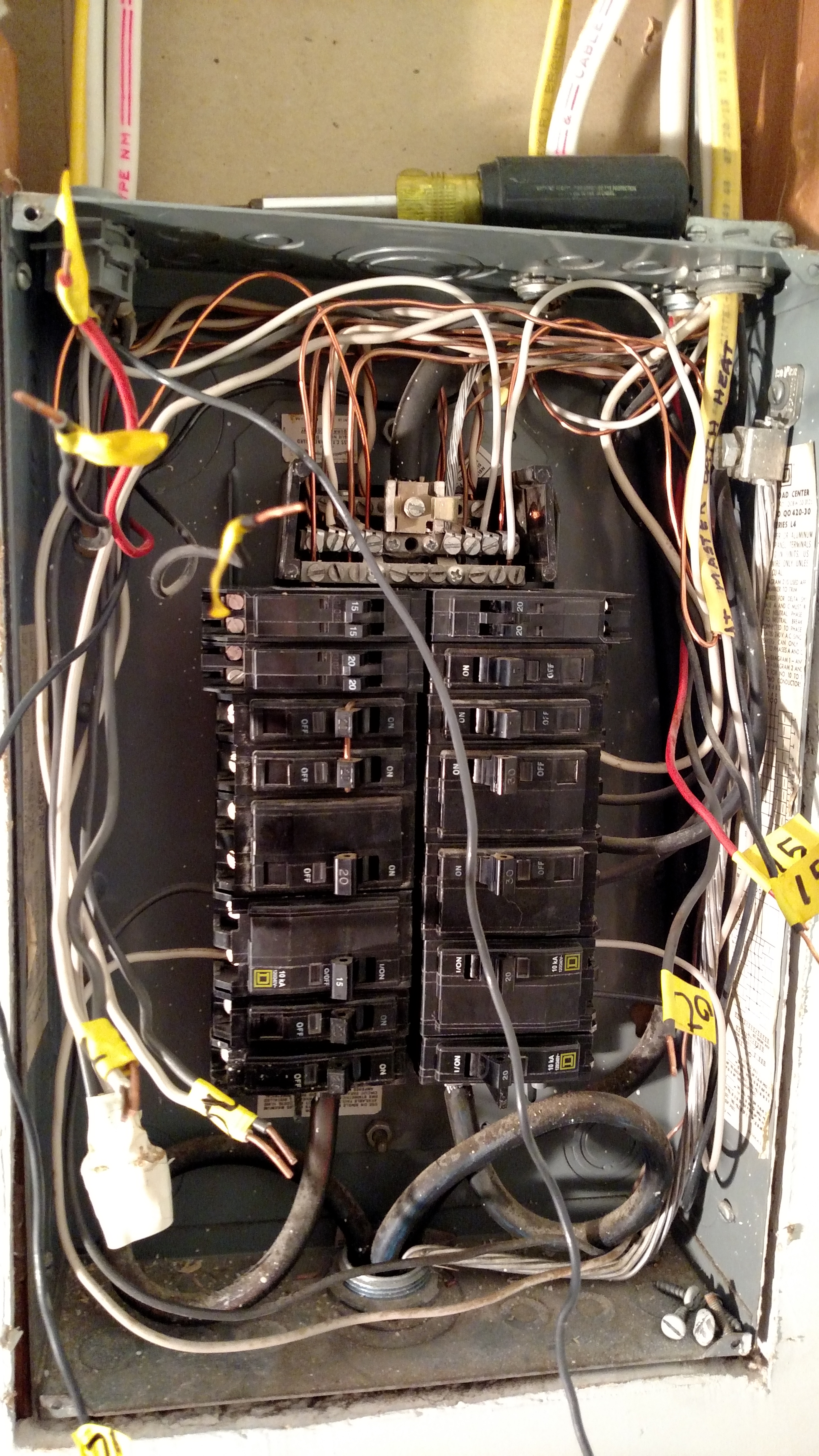 The upstairs breaker panel that we moved into was poorly wired, cramped, and needed replacing