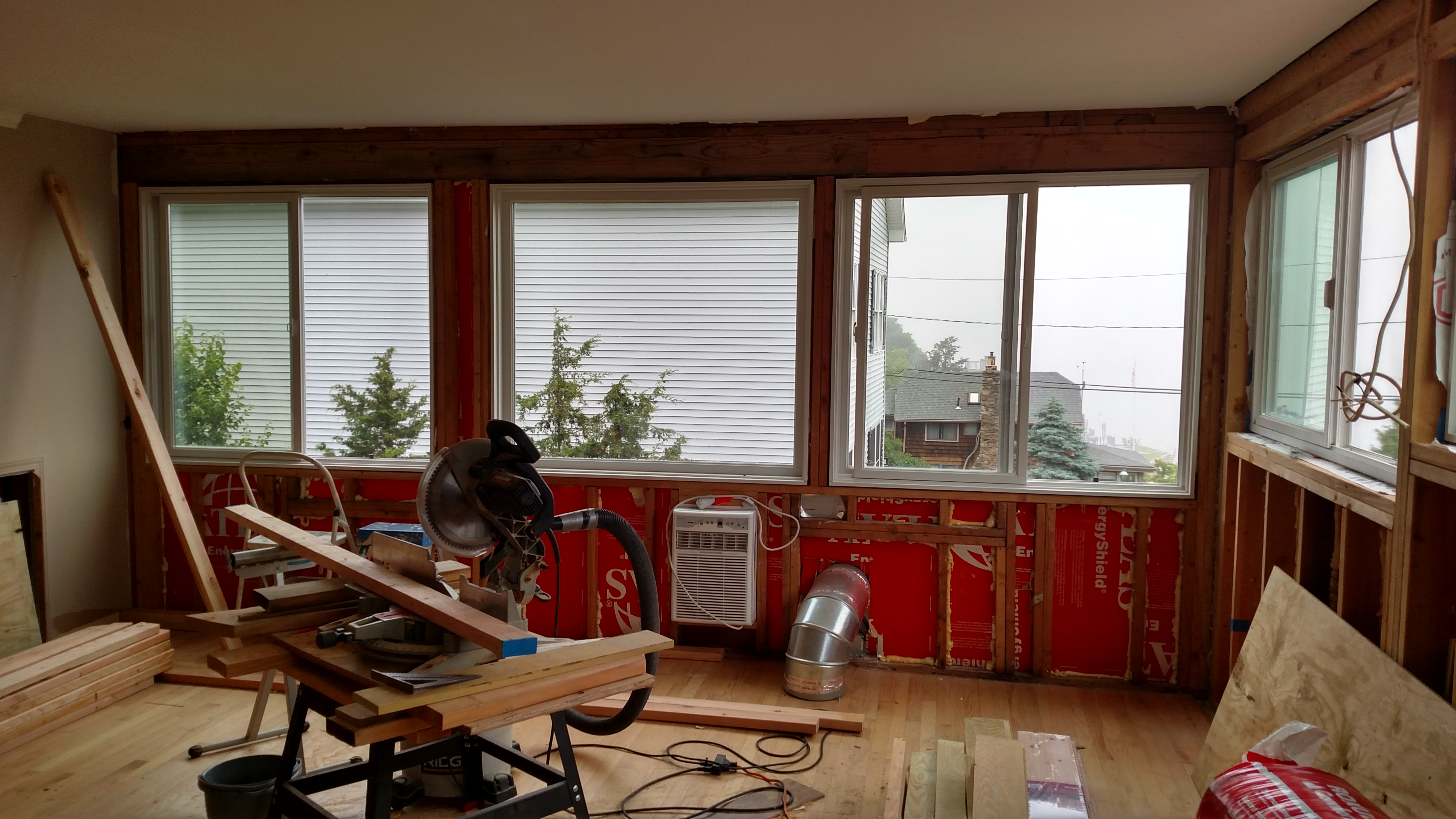 A before photo of the upstairs room. Also just a general feel for the commonplaceness of a chop saw in this house.